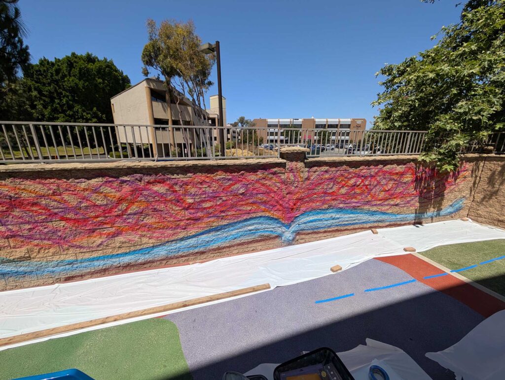 Learning Comes Alive mural by Yitzchok Moully at Chabad of Irvine for the Jewish Street Art Festival
