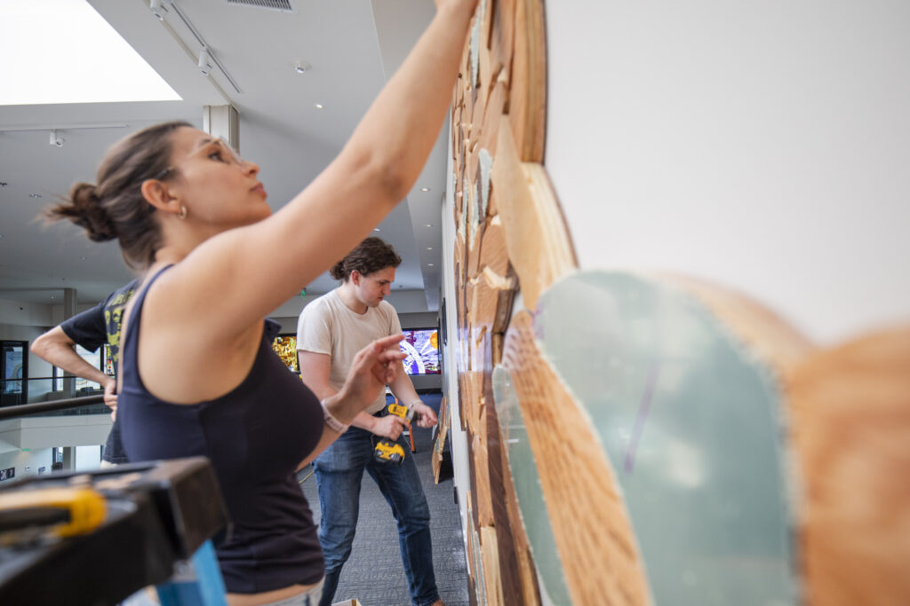 Alexander Golob Shir Ha-Ma'alot wooden mural for Jewish Street Art Festival