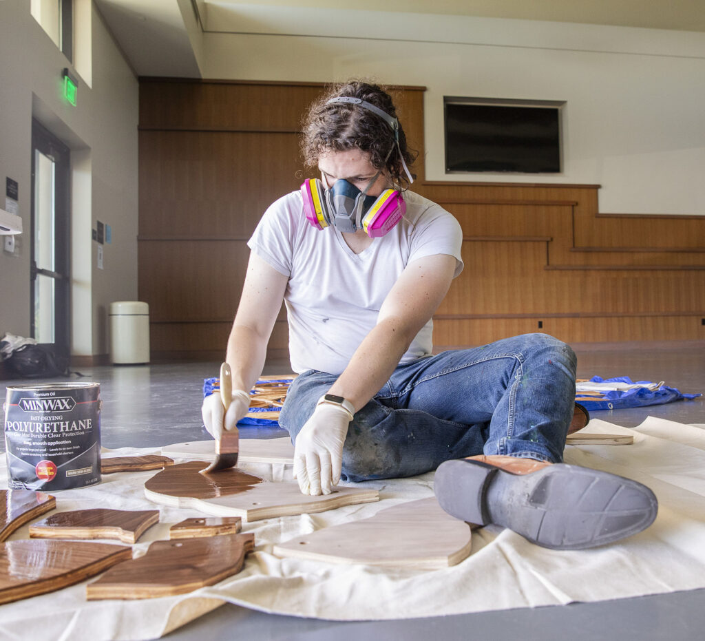 Alexander Golob Shir Ha-Ma'alot wooden mural for Jewish Street Art Festival